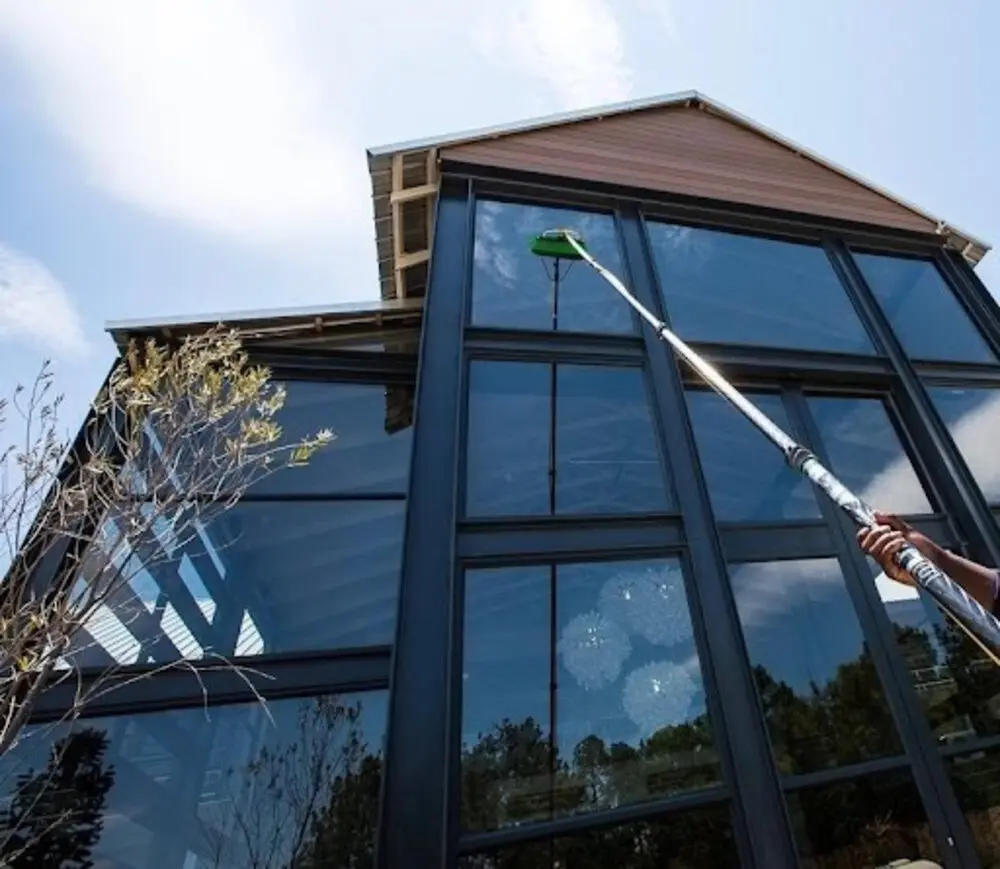 Exterior window cleaning with a water-fed pole on a commercial property in Edmonton